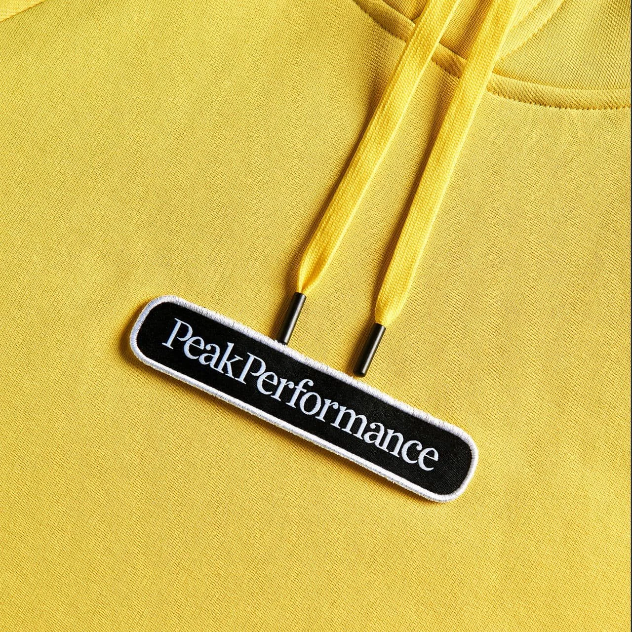 Peak Performance Hoody SEASONAL PATCH Citrine - Image 4